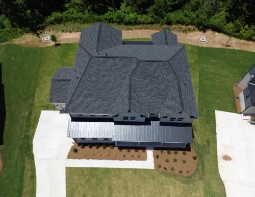 Professional roofing team completing a quality roof installation in Buford, GA