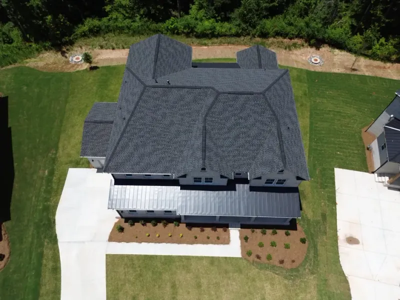 Best Buford Roofer team performing a free roof inspection on a residential home in Buford, GA